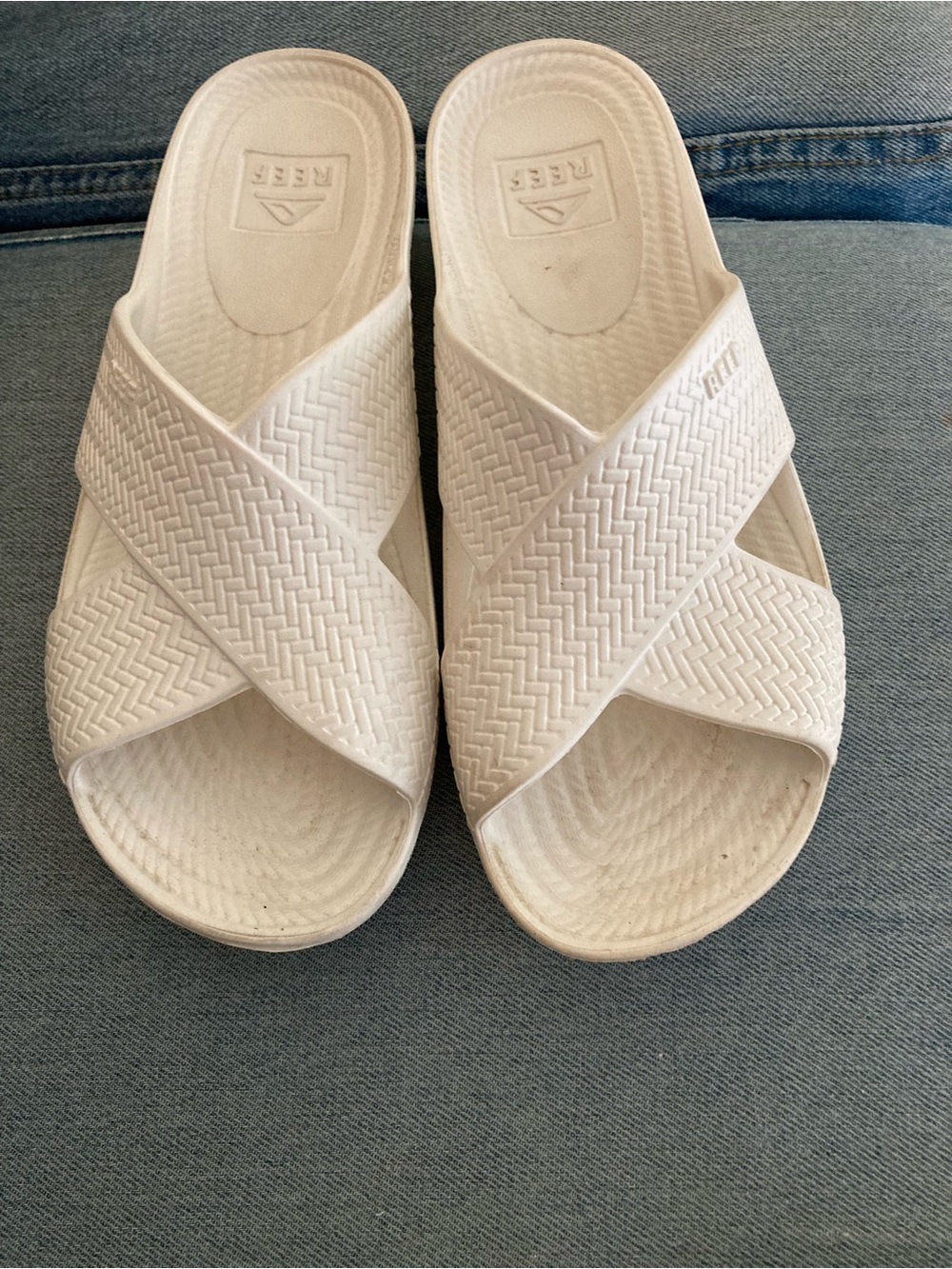 Reef women’s 9w white criss cross slide sandals.  Water shoes